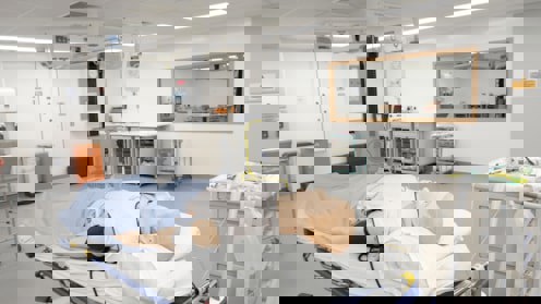 Fake person on a bed