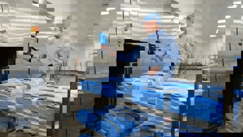 Person using a wall screen